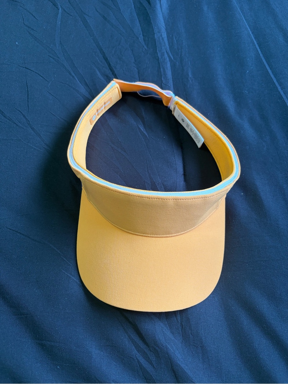 Lululemon Orange visor with white trim. Size s/m.